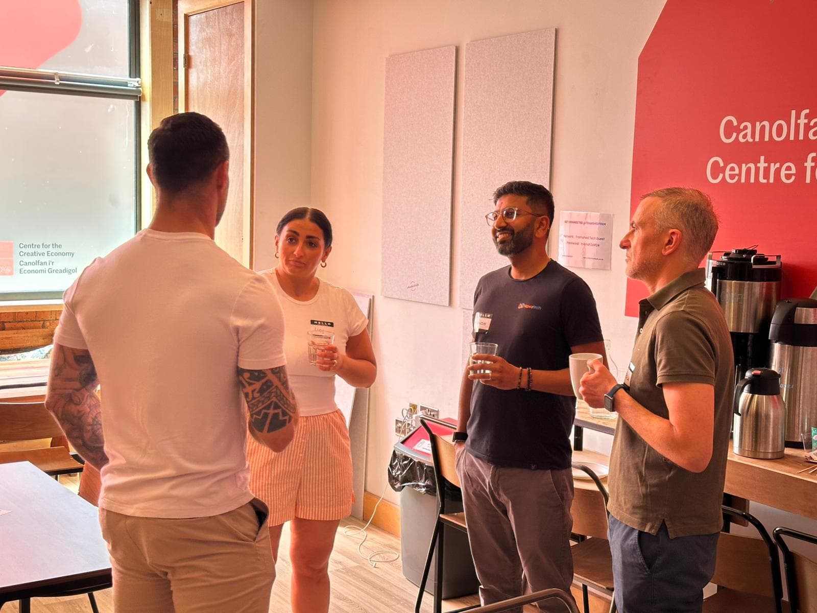 Cardiff AI professionals in group discussion at AI Wales event