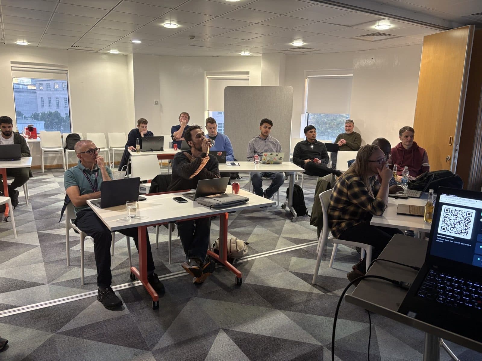 Attendees following along on their laptops at the AI Wales RAG Workshop