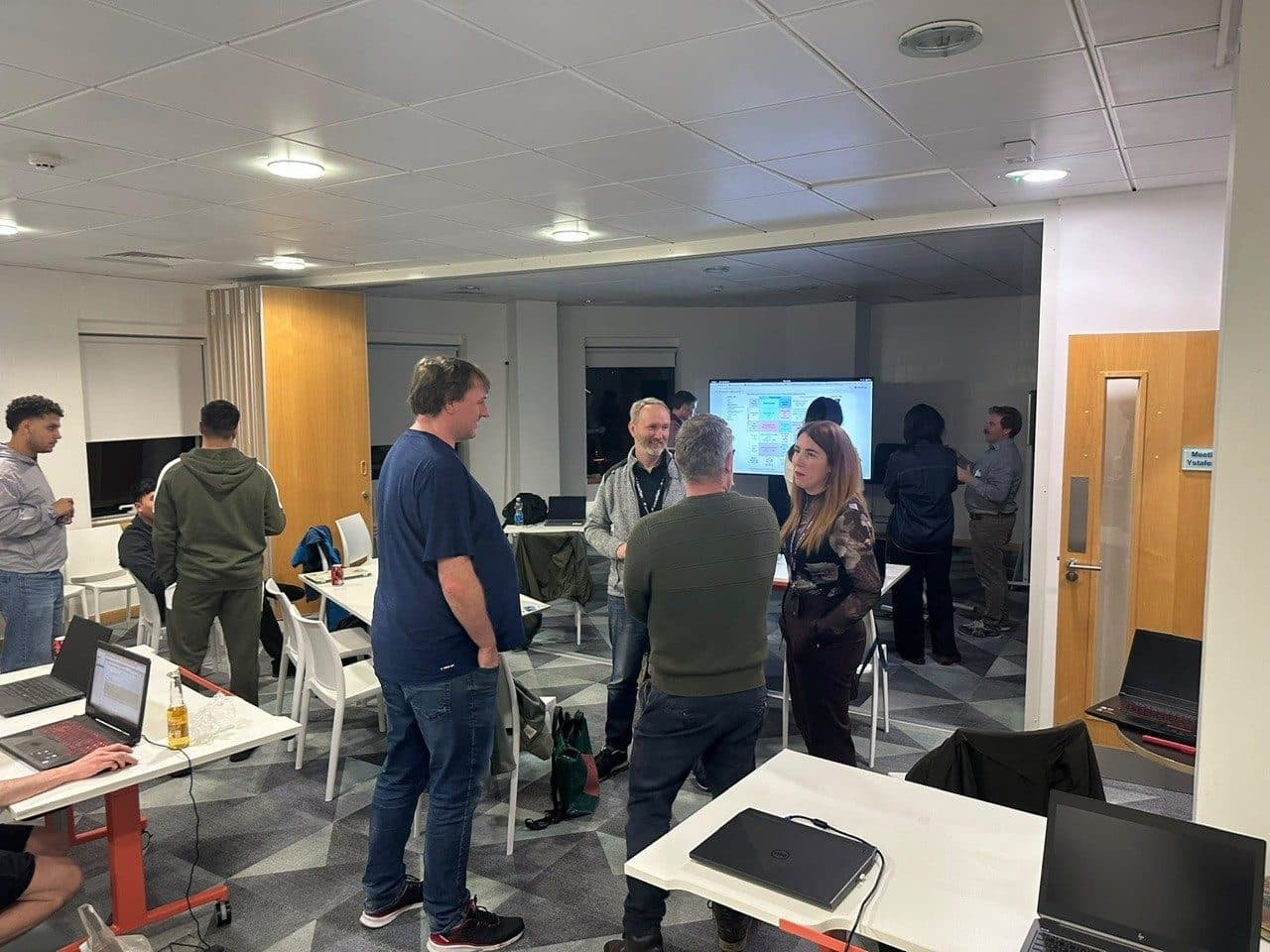 AI Wales members in conversation after the RAG Workshop