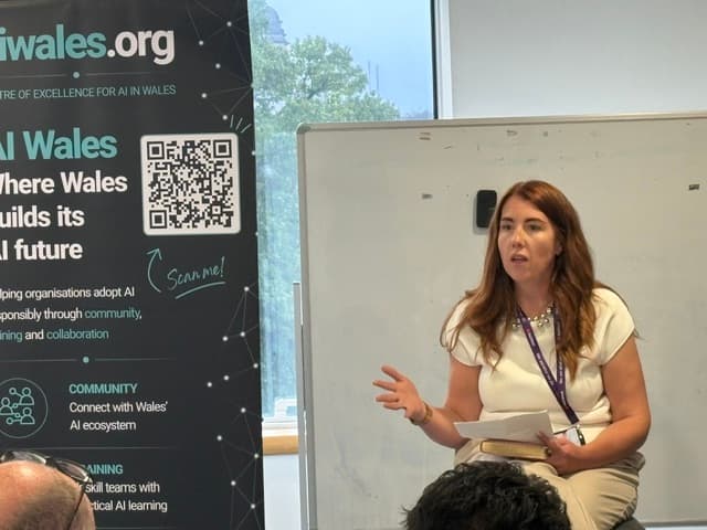 Speaker explaining a point to the audience at What Employers Are Really Looking For